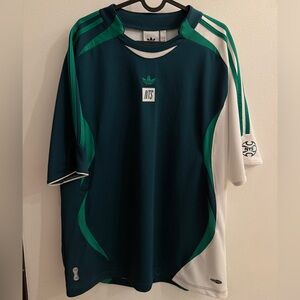 Green Adidas jersey / top